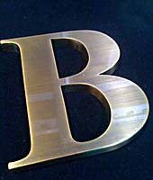brass lobby signs