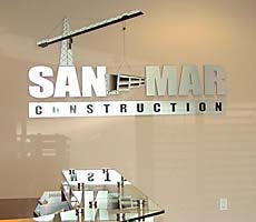 logo and lettering lobby sign